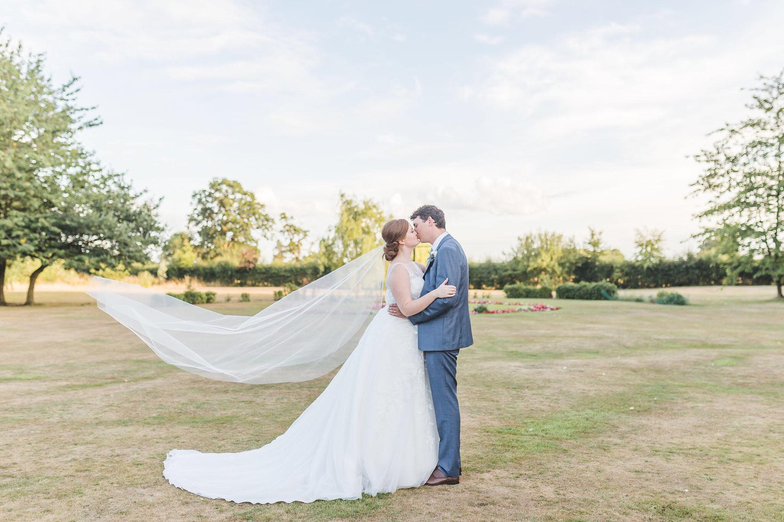 Real Bride | Sophia Tolli Dress | Barely There Veil | Freshwater Pearl and Crystal Earrings