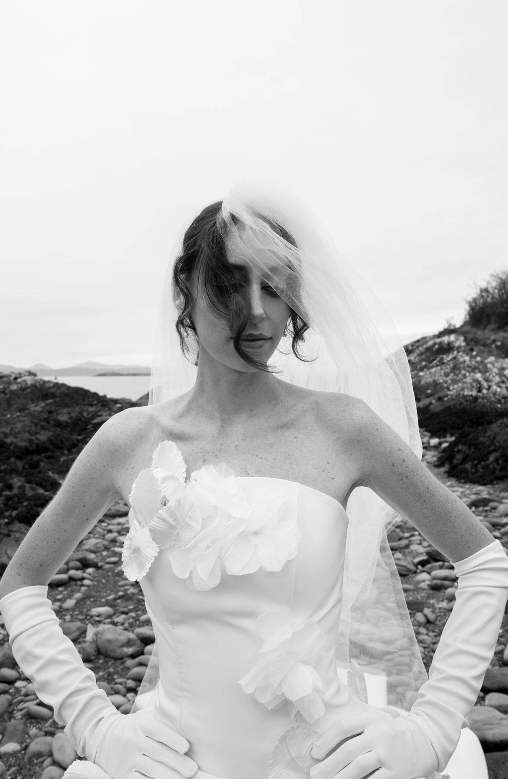 Windswept wedding veil picture on Irish clifftop