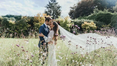 Real Bride | Nicole Milano Gown | Barely there wedding veil- 'Skylar' and Silver wedding tassel earrings- 'Gladys'
