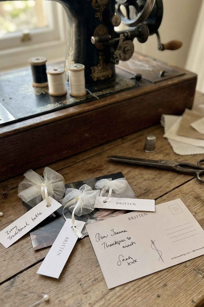 Tulle samples tied in bows and labelled, with a handwritten note from Sarah