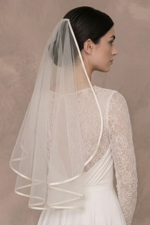 barely there waterfall wedding veil in italian tulle with cotton edge single tier bridal veil