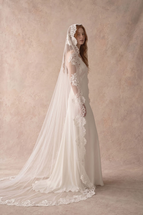 Valentina cathedral mantilla veil, with the floral lace edge spread across the train