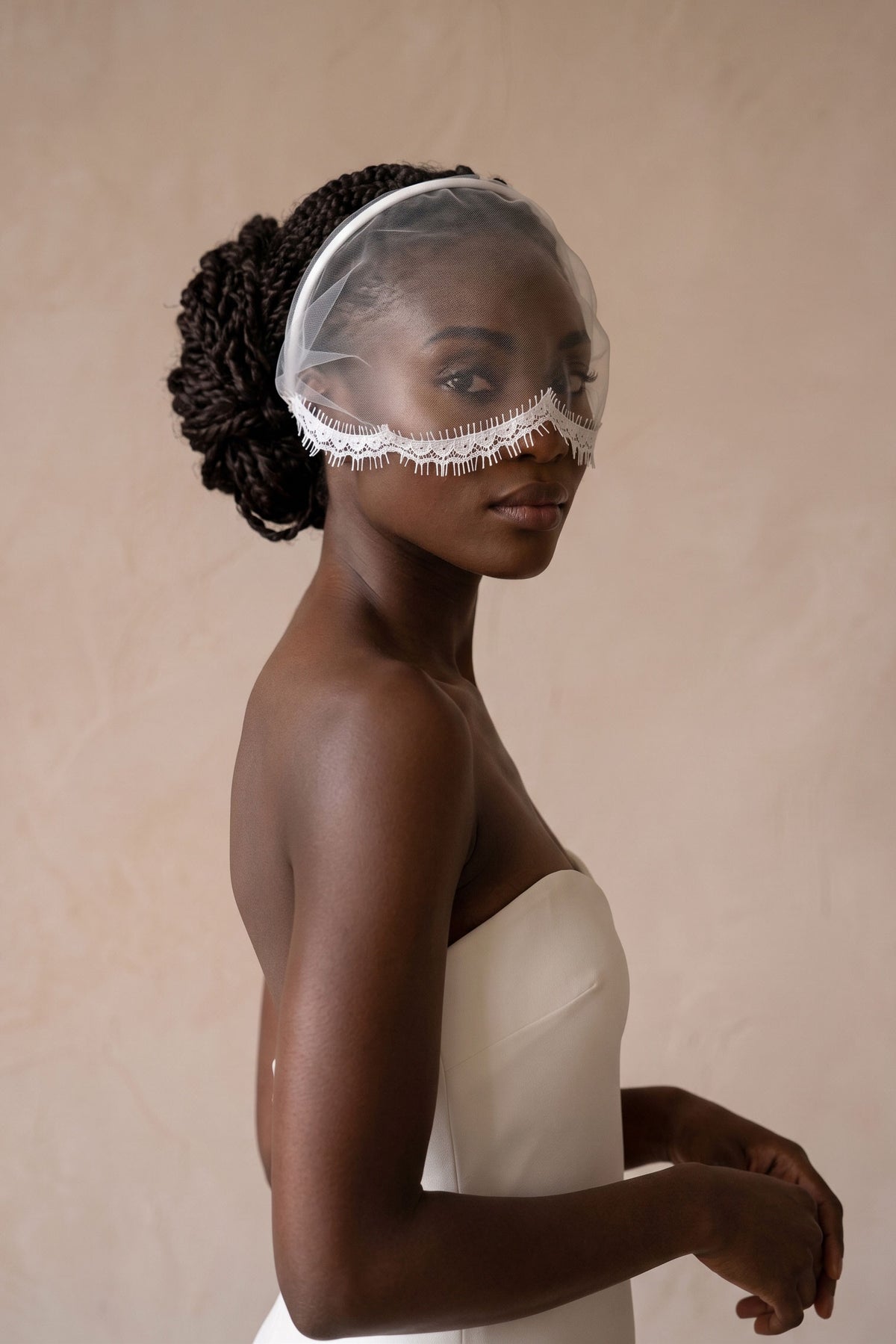 Vita voilette side view showing tulle falling over the eyes