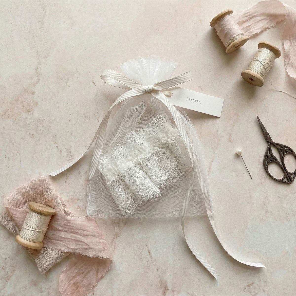 eyelash garter in dustbag