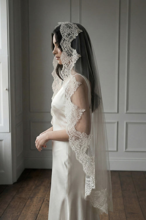 spanish veil dresses Antonia Ivory Lace and the embroidery was made by a group of artisans Spanish Wedding Dresses - Bride