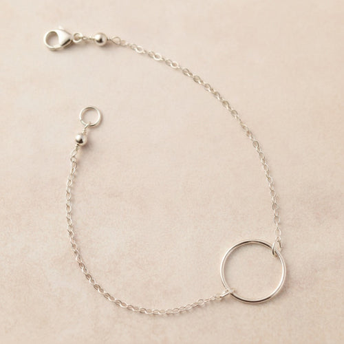 Dainty silver open circle bracelet with delicate chain, handmade in the UK