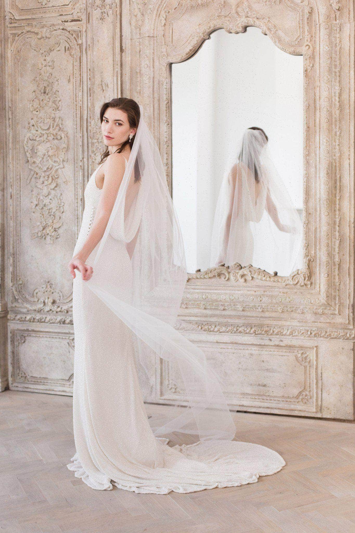 dress veil Seven Wedding Lengths: How To Choose The Perfect One soft tulle bridal veil Single Tier Cut Edge Veil