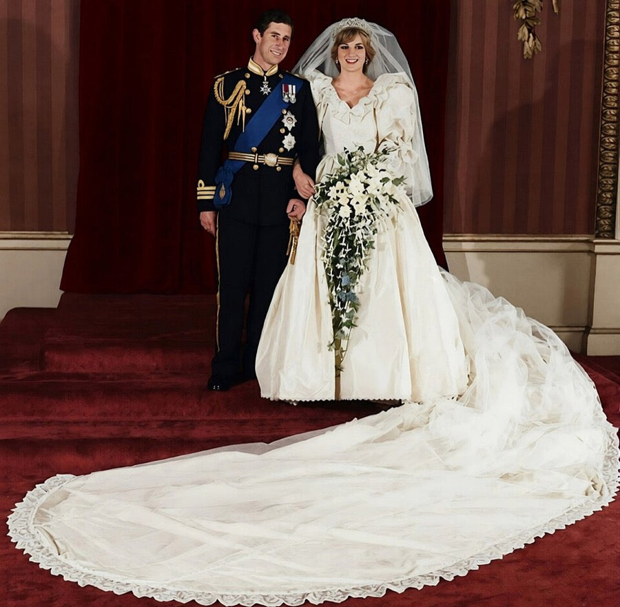 Princess Diana in her 1981 wedding portrait, ivory tulle veil and famous train