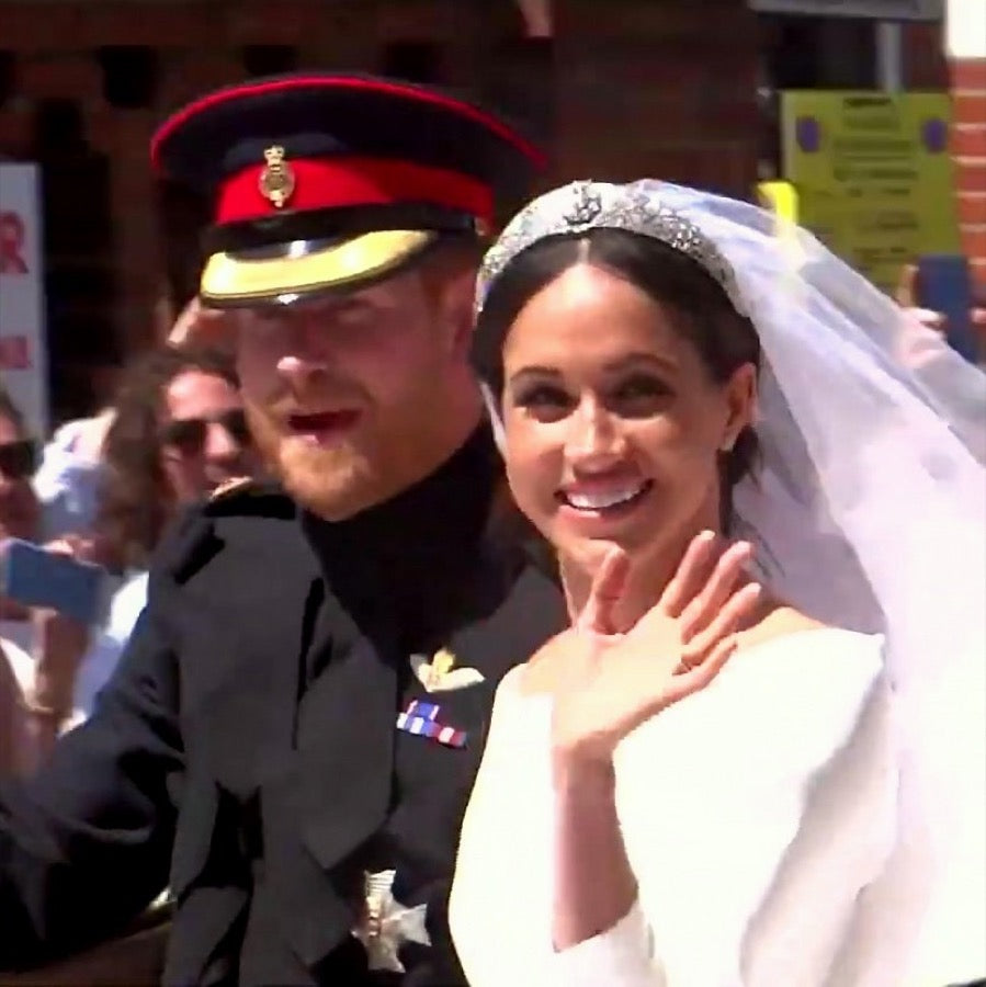 Meghan Markle in the carriage procession at Windsor in 2018, silk tulle veil held by a diamond bandeau tiara